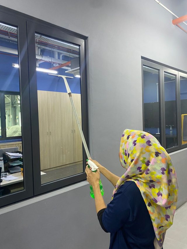 Office glass panel cleaning